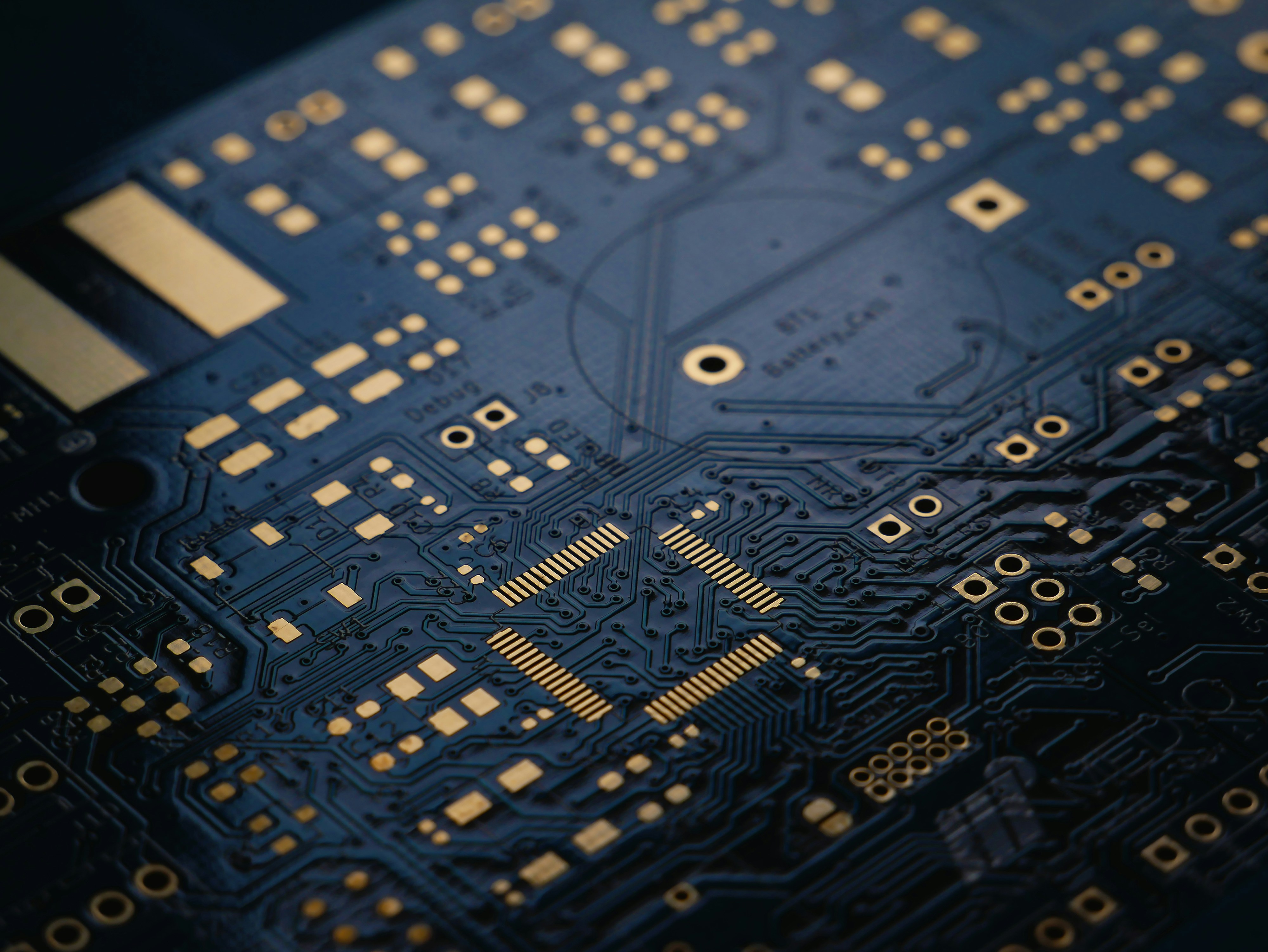 High-density PCB close-up with gold pads